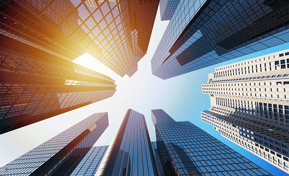 Construction workers at sunset